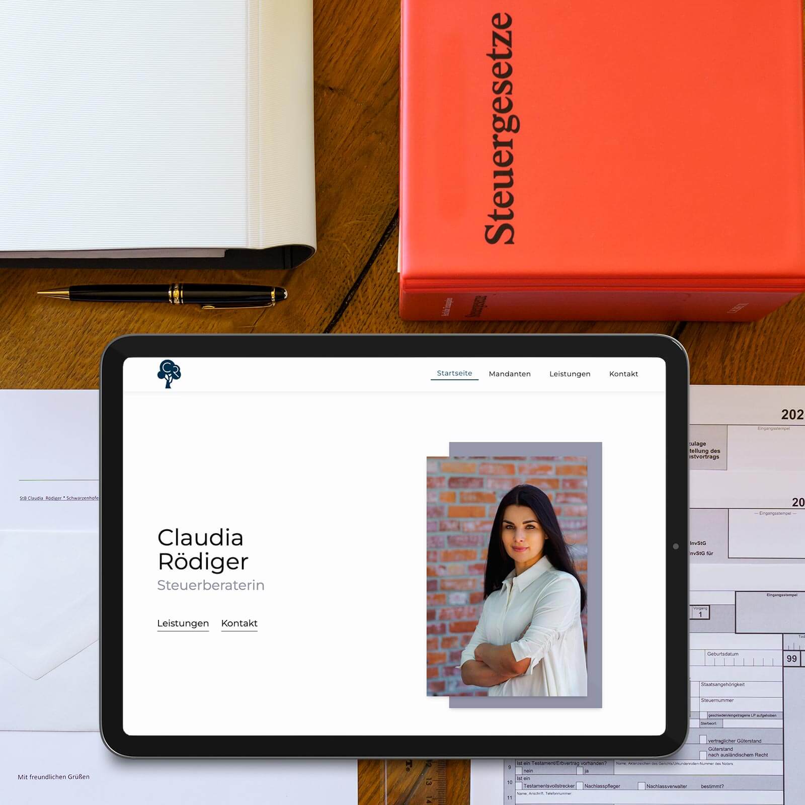 a tablet computer sitting on top of a wooden table